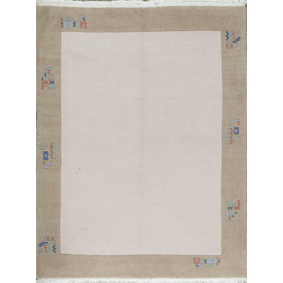 Tapis beige noué à la main de haute qualité