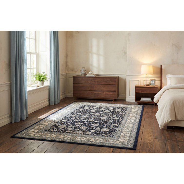 Tapis bleu/ivoire Attell