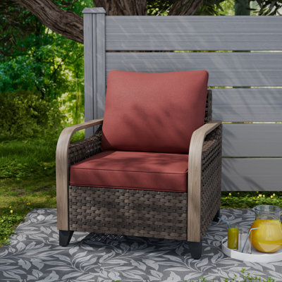 Fauteuil en rotin avec coussins pour l'extérieur