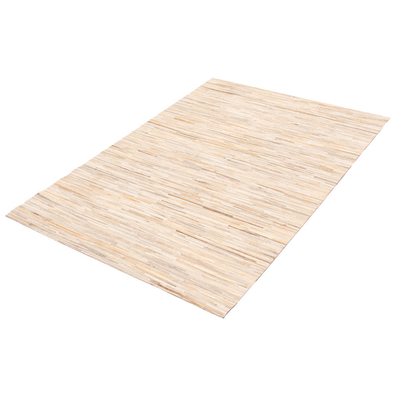 Tapis ivoire en cuir de vache fabriqué à la main Arunas