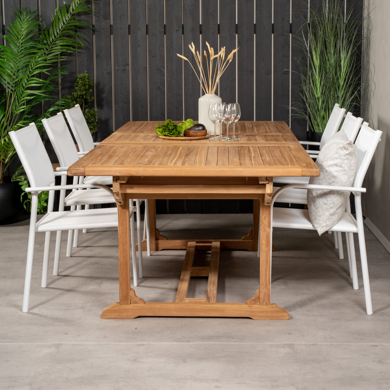 Baek 6 - Person Teak Solid Wood Patio Dining Set Extendable Rectangular Table