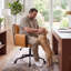 Chaise de bureau pivotante Jabali extra large en tissu bouclé avec structure en métal-134168469