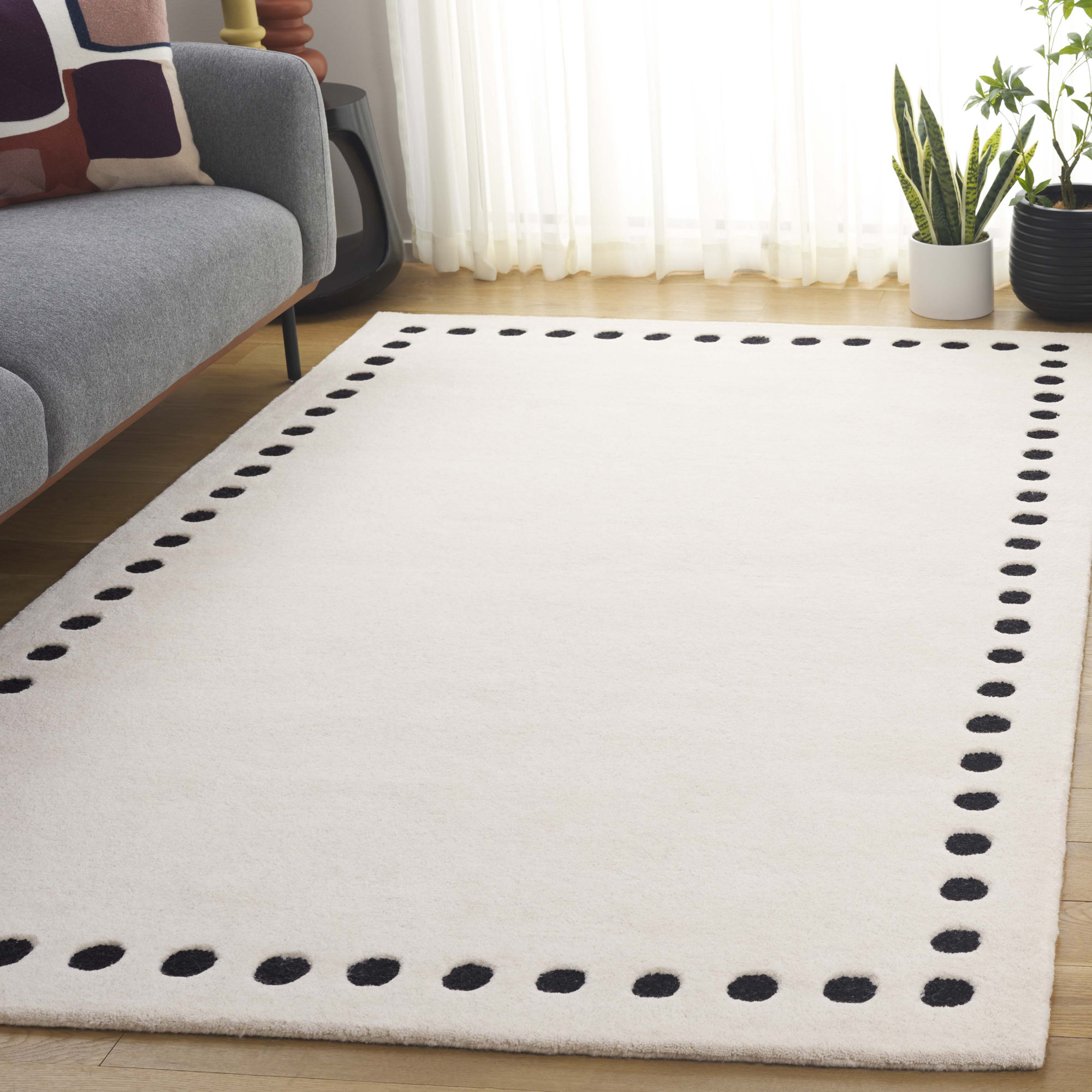 Lexy Polka Dots Handmade Tufted Cotton/Wool Area Rug in Ivory/Black, Rectangle 4' x 6'