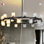 Lustre moderne noir à anneaux, grand luminaire suspendu rond de 16 lumières pour le vestibule du salon, hauteur réglable-1335345368-1340409692