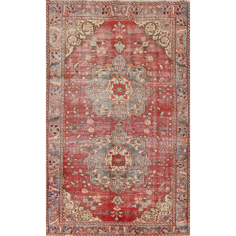 Tapis rouge en laine patiné 6 x 10