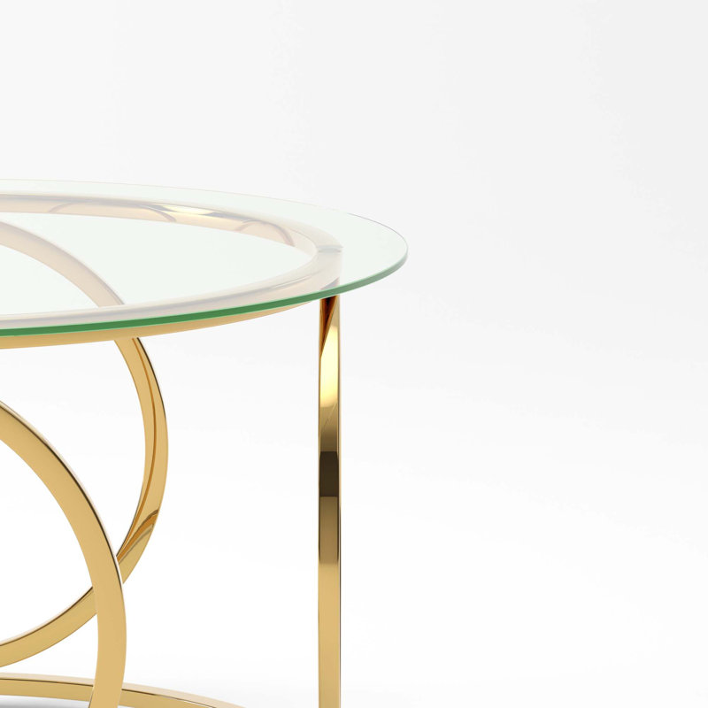 Table basse sculpturale moderne avec structure circulaire en métal