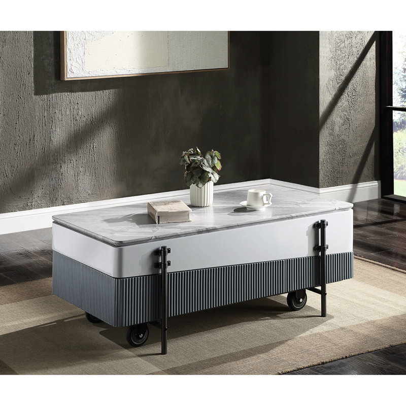 Table basse grise et blanche avec plateau relevable et bac pratique