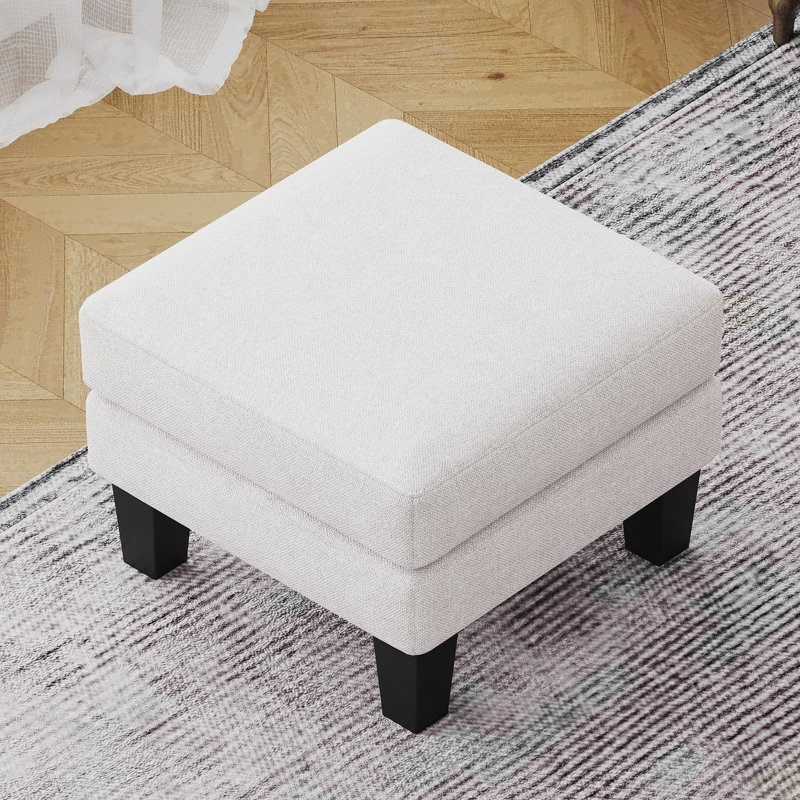 Repose-pieds en tissu beige