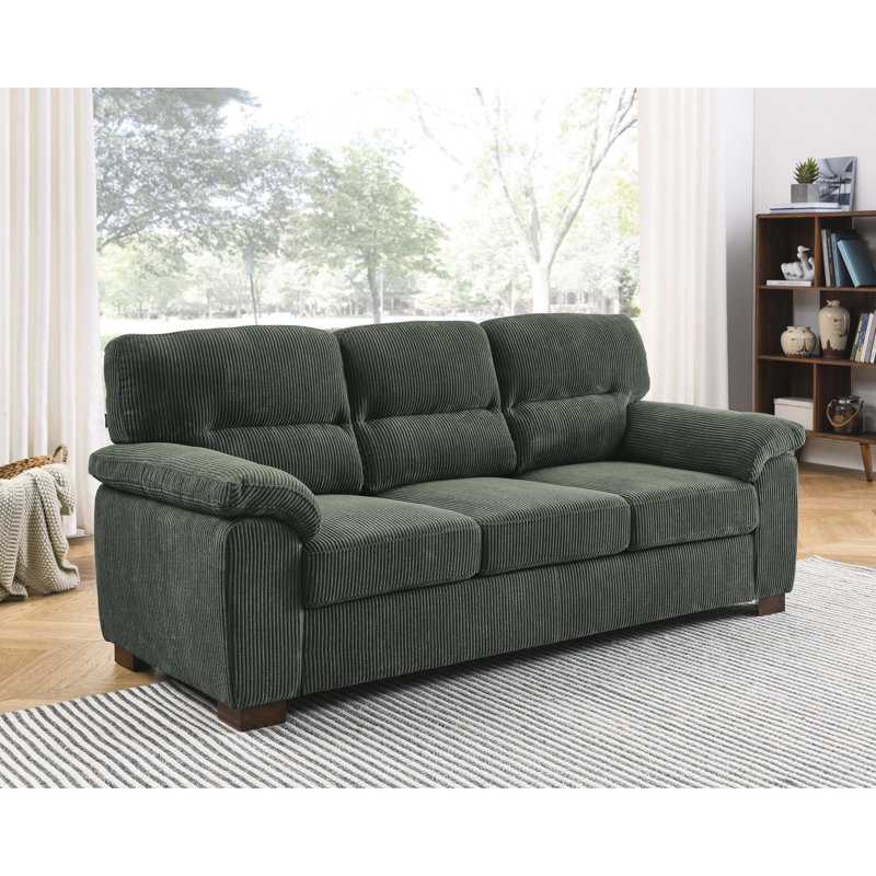 Canapé rétro à trois places avec coussins capitonnés moelleux et accoudoirs doucement roulés, combinant un style intemporel et une assise confortable
