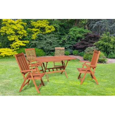 Gomes 4 - Person Eucalyptus Solid Wood Patio Dining Set Rectangular Table