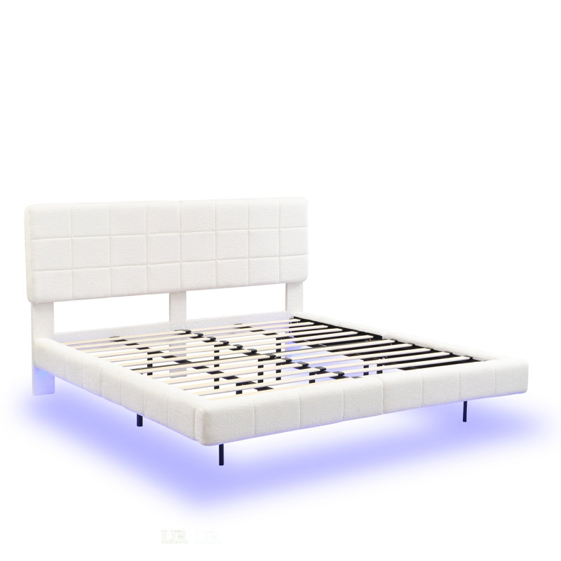 Très grand lit flottant blanc avec lumière alliant confort et design futuriste pour une expérience de sommeil unique
