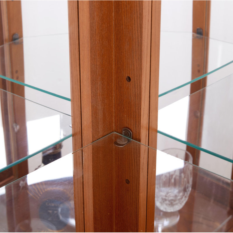 Enchanted by light, this Tempered Glass Display Curio Cabinet stands as a testament to elegance.