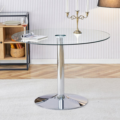Glass Top And A Modern, Minimalist Round Dining Table With Metal Legs. Ideal For Dining Rooms, Living Rooms And Meeting Rooms