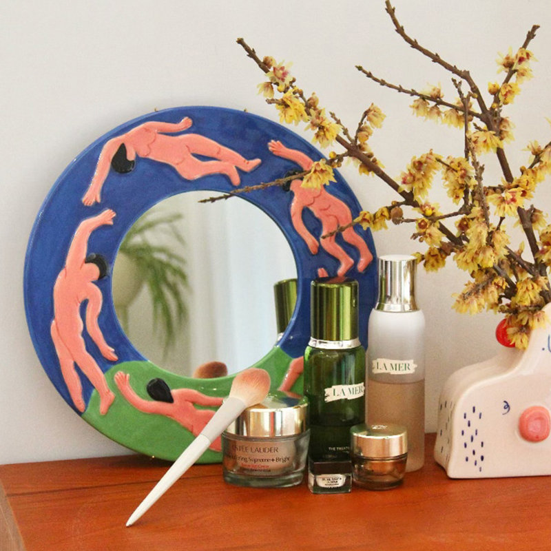 Miroir mural rond en céramique