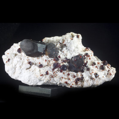 Smoky Quartz with Spessartine Garnets & Hyalite Opal.