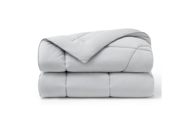 Gray Bedsure cooling comforter folded up and displayed against a white background.
