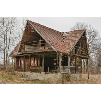 " Old Rural Abandoned Wooden Collapsing House Against Cloudy Sky In Autumn Season "