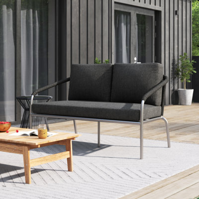 Catlin 58" Wide Loveseat with Cushions, written with the polished, high-conversion tone Wayfair uses — highlighting the aluminum frame, cushions, quick-dry mesh, arrives assembled, and rope accents.