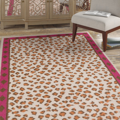 Tapis ivoire / rose vif en laine tissé à la main Colewood