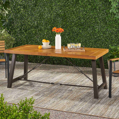 Table de salle à manger d'extérieur en bois d'acacia et en métal au design élégant pour toutes les maisons