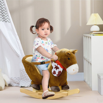 Bébé cheval à bascule, cheval d'équitation, berçant en peluche avec son réaliste, pédales pour les 18 à 36 mois