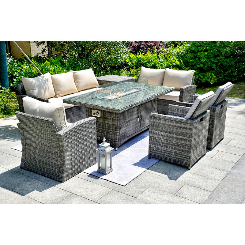 Aesha 8 - Person Wicker Patio Dining Set with Rectangular Table , Cushions Included