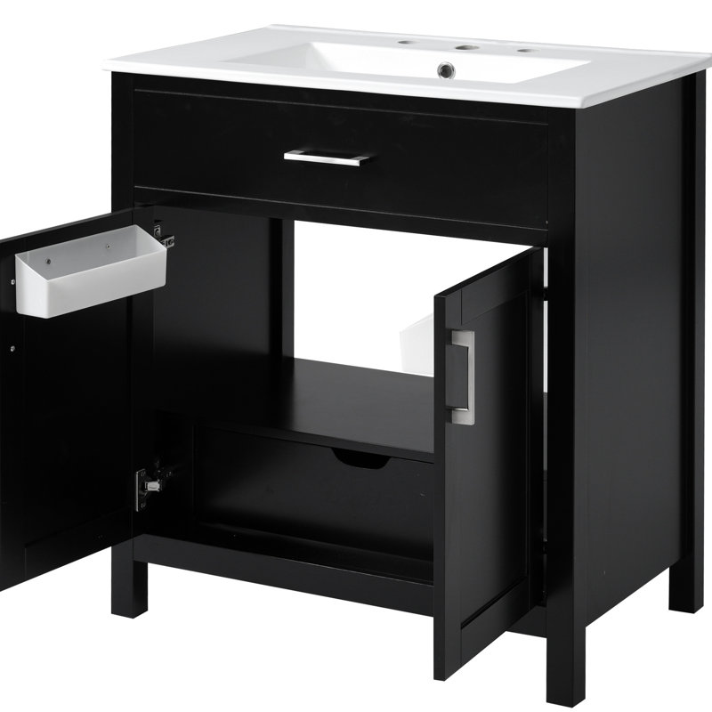 Meuble-lavabo noir de 30 pouces avec lavabo en céramique et beaucoup d'espace de rangement. Fabriqué en bois massif fiable. Fournit des tiroirs pratiques. Conception élégante. Rangement abondant à fermeture en douceur.