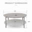 Table basse ronde d'extérieur avec plateau en métal antirouille et tablette en rotin tissé pour patio