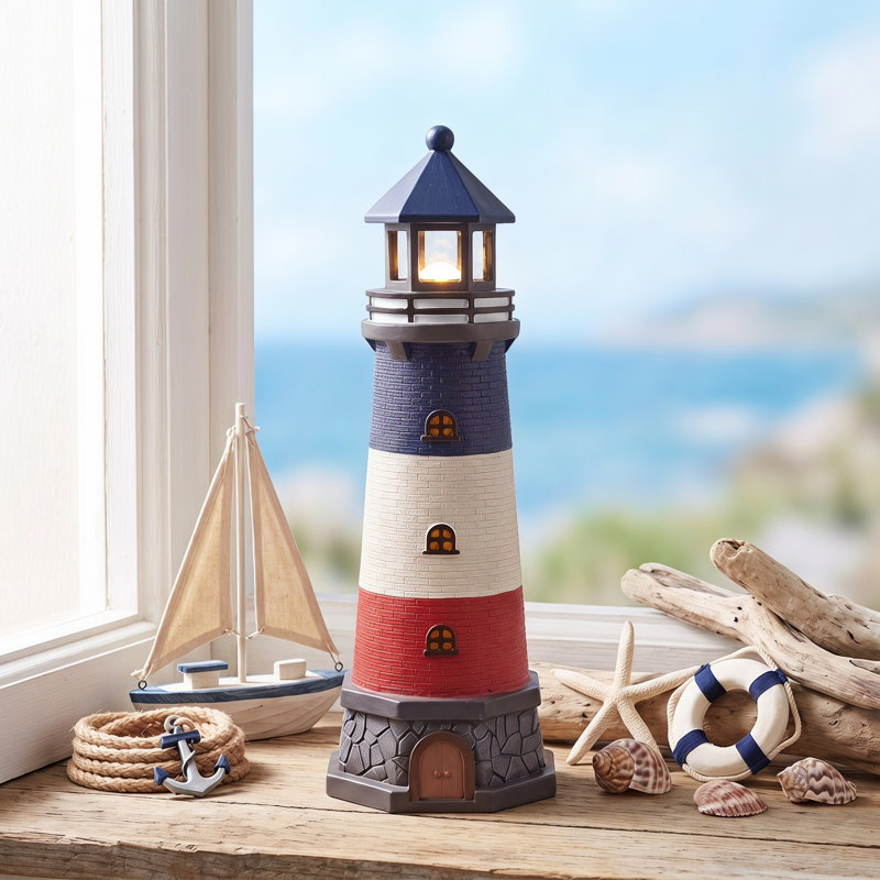 Statue de phare solaire en résine de 32,5 cm de haut avec accents bleus et lumière DEL, Bleu