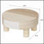 Table basse ronde avec plateau rabattable et rangement dissimulé, idéale pour un intérieur moderne et une organisation optimale de l'espace.