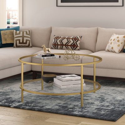 Gibbs Sivil 36" Wide Round Coffee Table with Glass Top in Brass