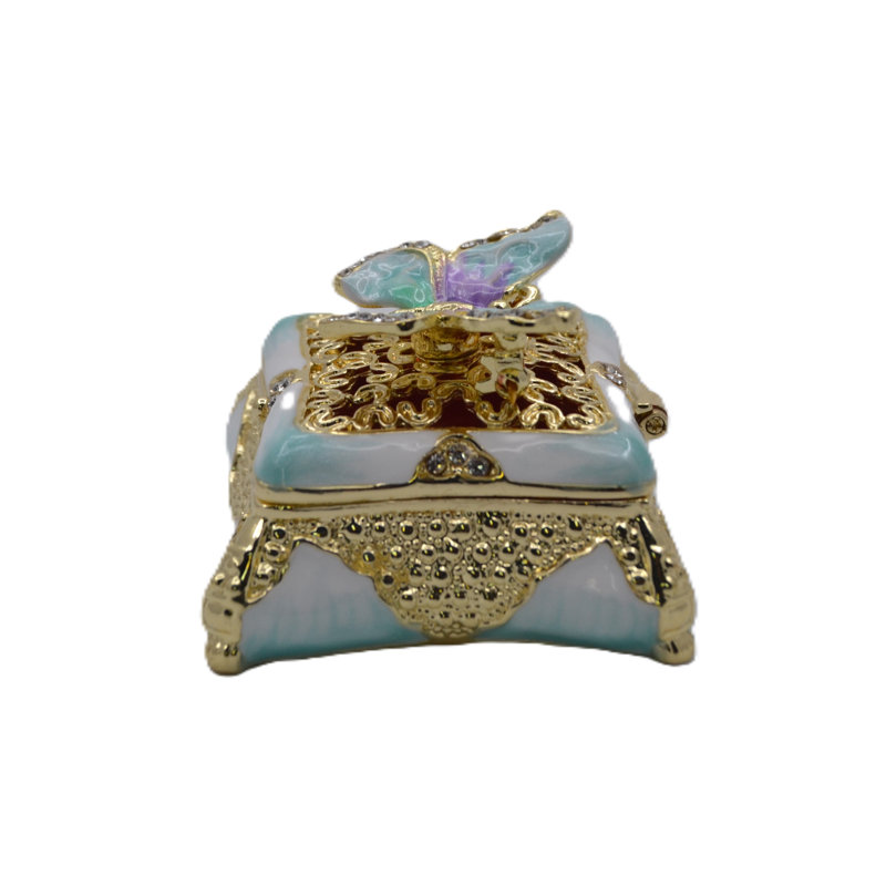 Petite broche papillon sur boîte décorative avec cristaux autrichiens