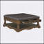 Table basse traditionnelle à finition brune avec 4 tiroirs de rangement, une tablette et un dessus rembourré, idéale pour le décor et la fonctionnalité du salon