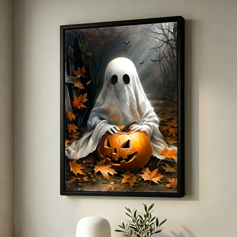 Personnage fantôme d'Halloween berçant une citrouille sculptée, tableau sur toile encadré, cadre noir, 40 x 60 cm, 16x24