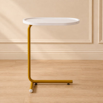 Simple white C-shaped cocoa sofa side table, compact and space-saving, suitable for placement next to the sofa or in the bedroom.