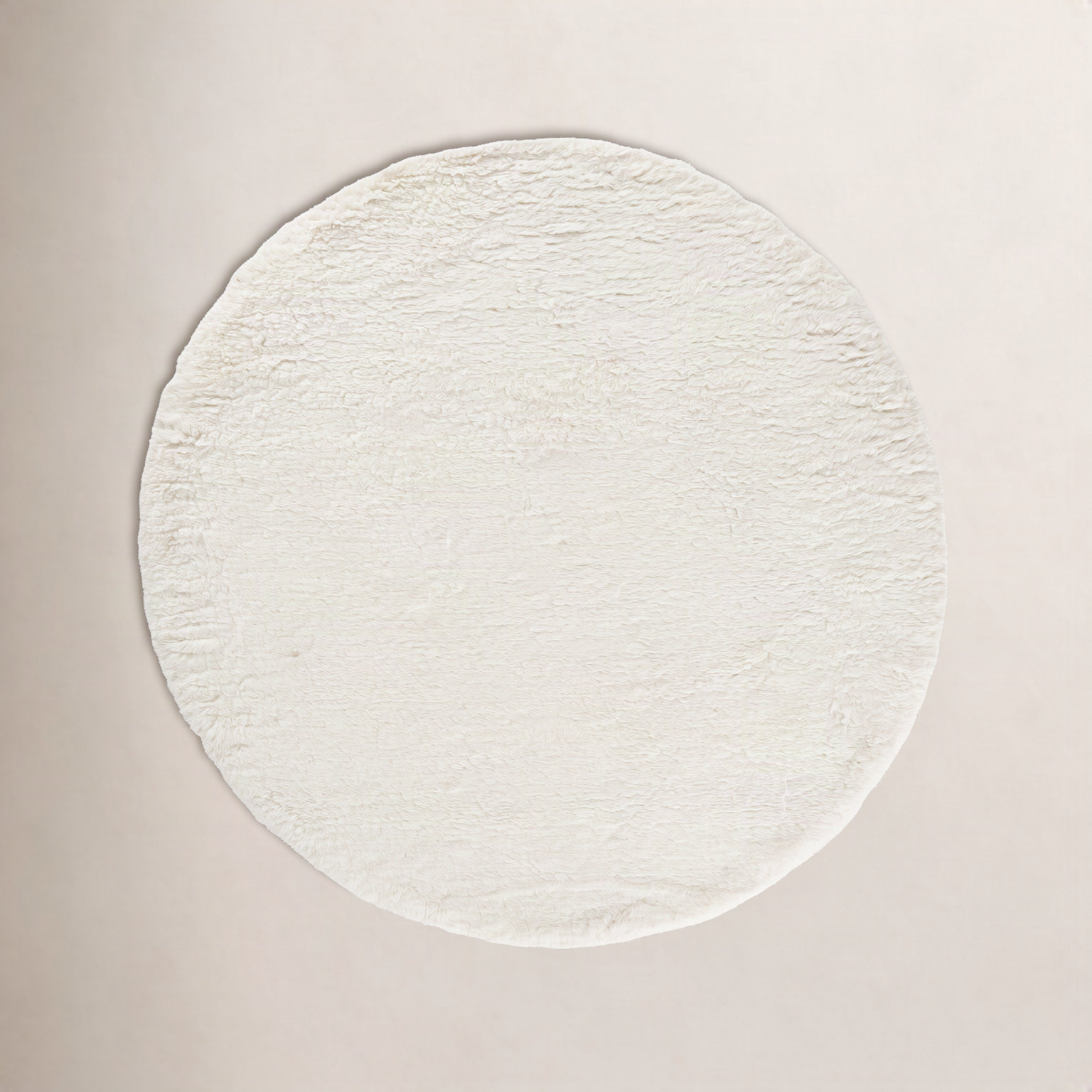 Abriel Ivory Solid Hand-Woven Wool Rug, Round 7'