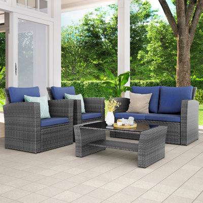 Ensemble de conversation pour patio 4 personnes en résine tressée PE résistante aux intempéries, mobilier d'extérieur en rotin tressé à la main avec coussins en oléfine imperméables, idéal pour le jardin, la terrasse ou le patio.
