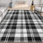 Tapis noir à tissage plat Kehr-88979012