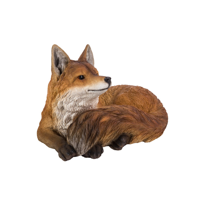 Statue renard allongé