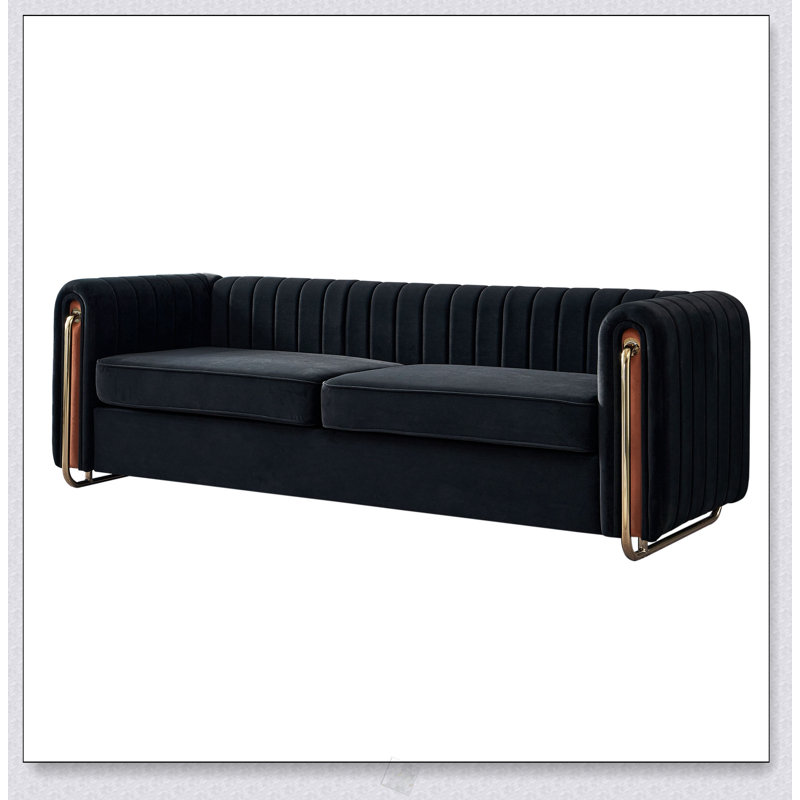 Canapé moderne en velours avec dossier capitonné et structure durable, pour plus de confort et de style dans tout espace de vie.