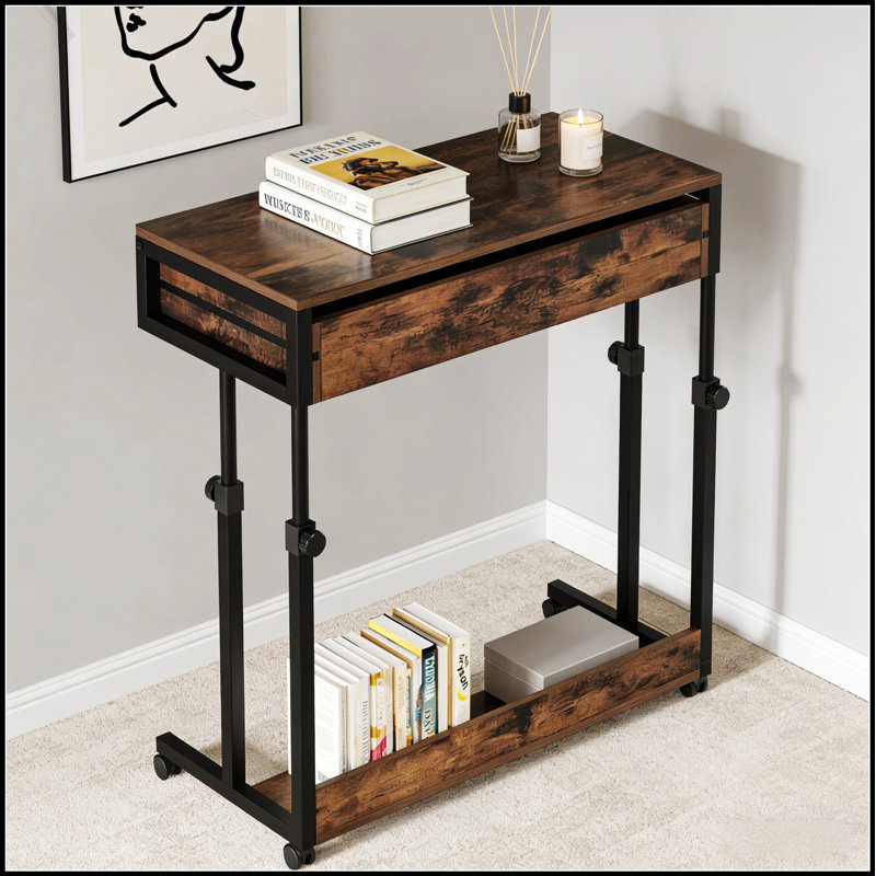 Bureau mobile compact à hauteur ajustable avec roulettes, parfait pour les espaces de travail et de vie flexibles.