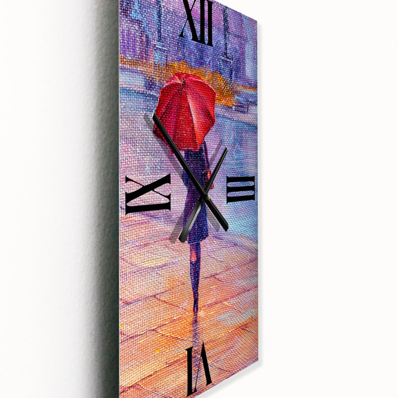 Horloge murale femme marchant avec un parapluie sous la pluie, Petit