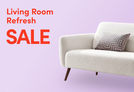 Living Room Refresh Sale promotional banner featuring a white bouclé sofa with geometric cushion on a lavender background