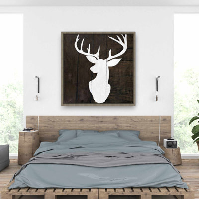 Silhouette d'un cerf sur bois | Toile brune encadrée