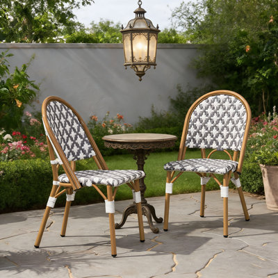 french Chair Set of 2 with Rust-Resistant Aluminum Frame and Durable Polyethylene Rattan Weave for Outdoor Elegance.