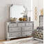 Commode élégante à 7 tiroirs avec garniture de miroir biseautée, mobilier de chambre à coucher moderne pour des intérieurs glamour et sophistiqués