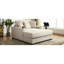 Chaise longue de 140 cm en chenille crème avec station de charge et porte-gobelets intégrés aux accoudoirs pour un confort optimal à l'intérieur. Housse amovible et lavable surdimensionnée pour se détendre à la maison.