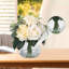 Roses et pivoines artificielles dans un vase en verre avec de l'eau artificielle pour les centres de mariage-285440056