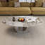 Table basse moderne en pierre frittée 49,2 po avec base en O en acier inoxydable - H 15,6 po