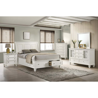 Elegant Eastern King Storage Bed with Carved Headboard